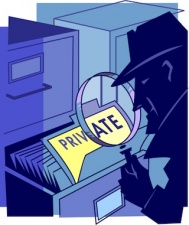 Burglar looking at private files in a cabinet