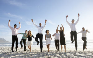 Professionals Jumping on Beach